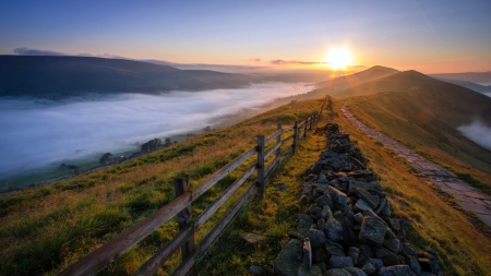 wooden fence along the spine of a mountain - dawn, trail, fog, sunrise, fence, mountain