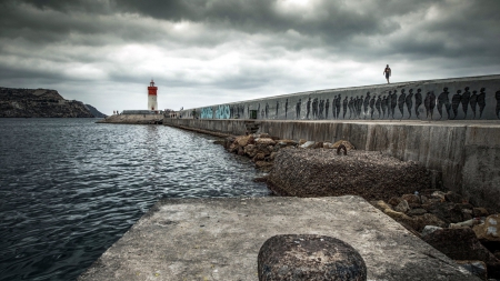 lighthouse at the end of a wharf - lighthouse, clouds, graffiti, bay, wharf