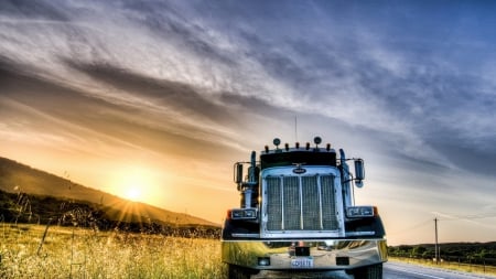 truck parked along a highway - truck, hill, highway, sunset, field