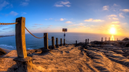 chain across a sea cliff at sunset hdr - view, poles, chain, cliff, hdr, sunset, sea