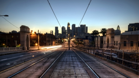 trolley tracks over a city bridge hdr - dawn, tracks, hdr, city, light, bridge