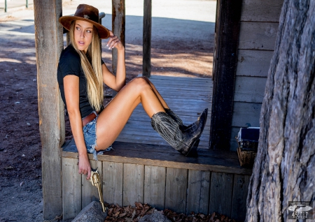 Cowgirl Gunslinger - famous, style, fun, female, fashion, boots, hats, buildings, outdoors, western, beautiful, ranch, guns, cowgirsl, barn