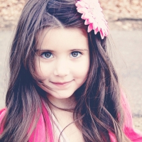 Children girl hair brunette face eyes smile