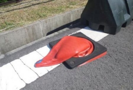 YOU KNOW IT'S HOT WHEN - ROAD, CONE, HEAT, MELTING