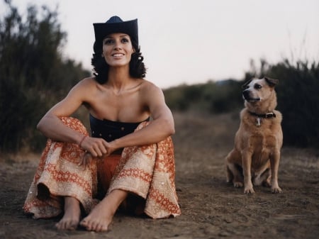 Cowgirl With Her Pooch - famous, women, style, fun, models, female, animals, fashion, cowgirls, hats, outdoors, rodeo, western, beautiful, ranch, dogs