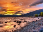 gorgeous sunset over stone beach hdr