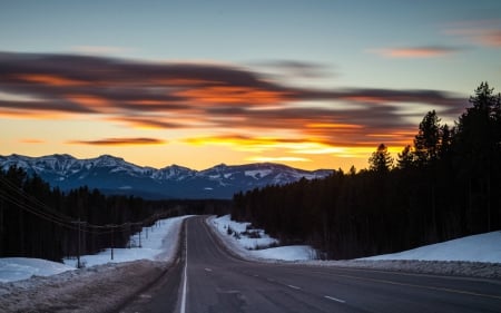 Traveling through the Rocky Mountains in Alberta, Canada - canada, highway, mountains, sunset