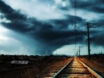 tracks to storm clouds