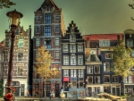 wonderful city block on a canal in amsterdam hdr