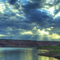 heavenly sun rays over a river hdr