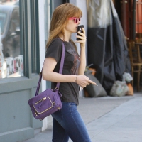 Isla Fisher gorgeous Hollywood girl on cellphone