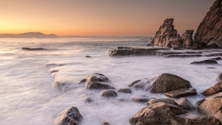 sea rushing over rocky shore - shore, sunset, mist, sea, rocks