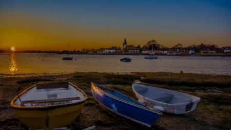 rowboats on a harbor shore at sunset  - town, harbor, sunset, boats, shore