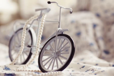 :) - pearls, figurine, bicycle, toy, wheel