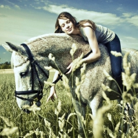 COWGIRL ON HORSE