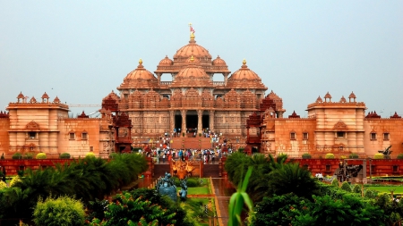 hindu temple of akshardham in delhi india - temple, domes, trees, people