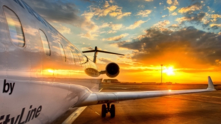 fantastic sunset behind a plane on the tarmac hdr - clouds, airport, sunset, hdr, plane, tamac