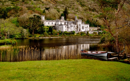 beautiful monastery kylemore abbey in ireland - trees, boat, lake, mountain, monastery