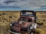 rusted gmc pickup on the prairie hdr