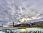 golden gate gate bridge above a marina hdr