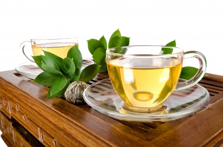 Green Tea - drink, green tea, cups, background, tea, leave, cup, tables, white, white background, table, leaves, green, drinks