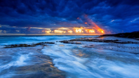 wonderful sunset on the horizon - clouds, horizon, shore, sunset, beams, waves, sea, rocks