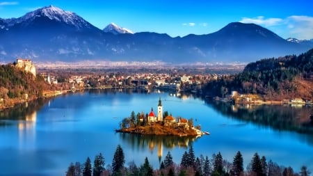 amazing lake bled in slovenia - rown, lake, church, island, mountains