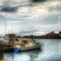 commercial fishing boats at the docks hdr