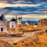 castle and beautiful windmills in toledo spain hdr