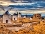 castle and beautiful windmills in toledo spain hdr