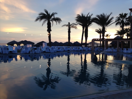 Sun setting on the Royal Solaris, Los Cabos, Mexico - reflections, royal solaris, beach, mexico, ocean, sky, palm trees, los cabos, vacation