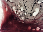 Owl pendant and red feather