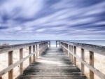 lovely sky over beach boardwalk hdr