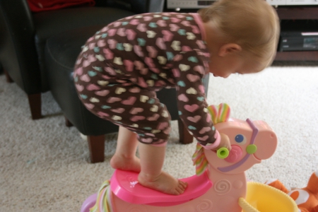 LOOK MOM I AM STANDING UP - rockinghorse, chiild, adorable, toy, cute