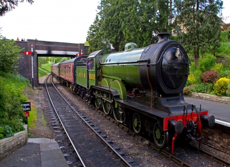 Green Train - abstract, tracks, trees, bushes, grass, wheels, black, train, nature, green, dirt, sky, bridge