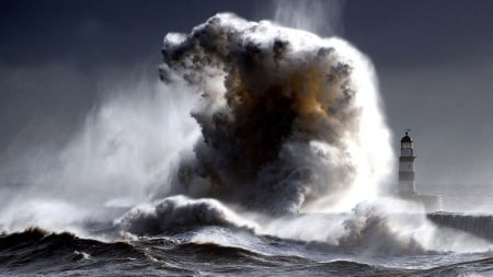 Big Wave Hits Lighthouse in England