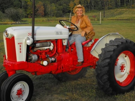 Cowgirl Riding A Tractor - fun, cowgirls, outdoors, female, tractors, ranch, farm