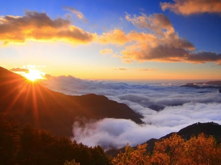 Beautiful Sunset - clouds, trees, hills, ray, sunset, nature, mountains, sun, sky