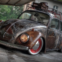 a well rusted vintage vw beetle