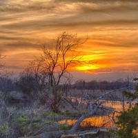 golden sky reflecting on a river hdr