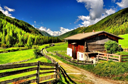 Mountain houses - sky, greenery, path, cottages, pretty, walk, clouds, grass, fence, houses, mountain, hills, summer, huts, lovely, nature, beautiful, rest