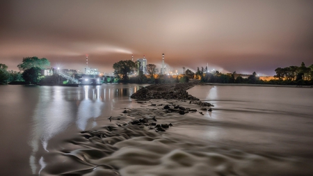 flowing river by a power plant on a misty eve - river, flowing, mist, evening, plant, rocks