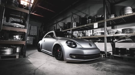 new vw beetle in a rim shop - rims, car, shop, silver