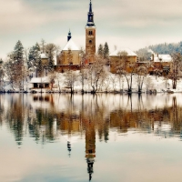 church on a lake island in winter