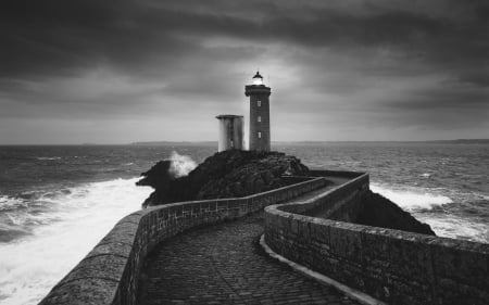 stone path to a lighthouse on a point - path, point, lighthouse, sea, black and white, stones