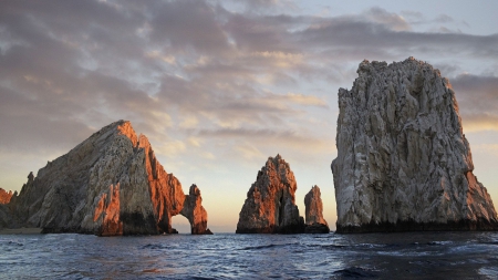 wonderful coastal boulders - boulders, clouds, coast, arch, sea