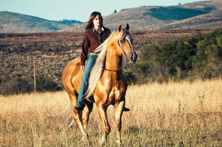 COWGIRL AND HORSE EXPLORING - women, fun, girls, sky, female, cowgirl, field, cowgirls, mountains, western, horses, style, westerns, boots, outdoors, brunettes, horse, ranch