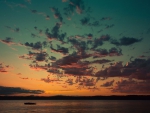 beautiful colored clouds over a lake