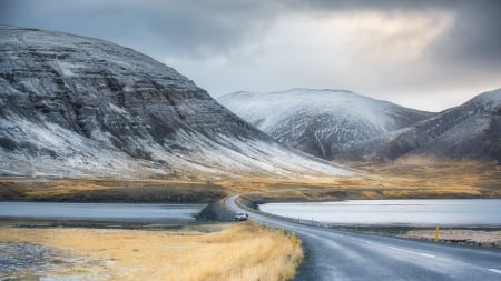 road over an earthen bridge on a lake - lake, mountains, car, road, clouds, bridge, earth