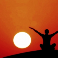 Meditating at sunset